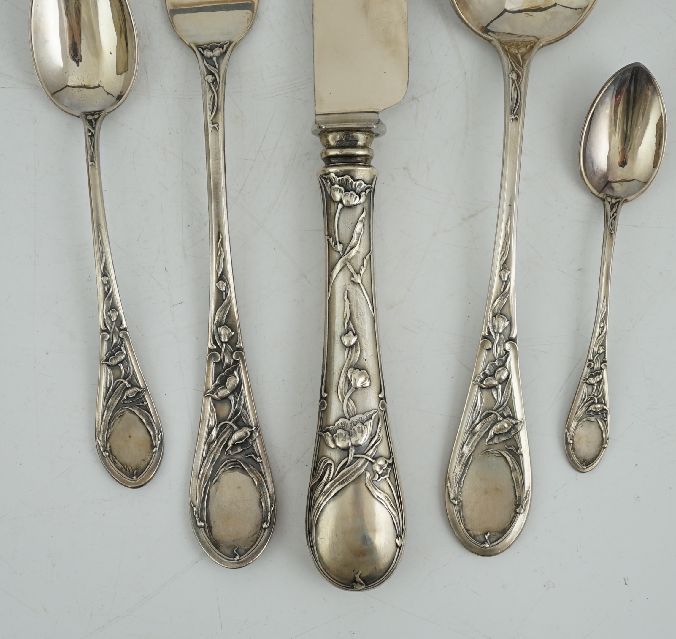 An early 20th century Russian 84 zolotnik silver five piece personal cutlery set by Ivan Khlebnikov